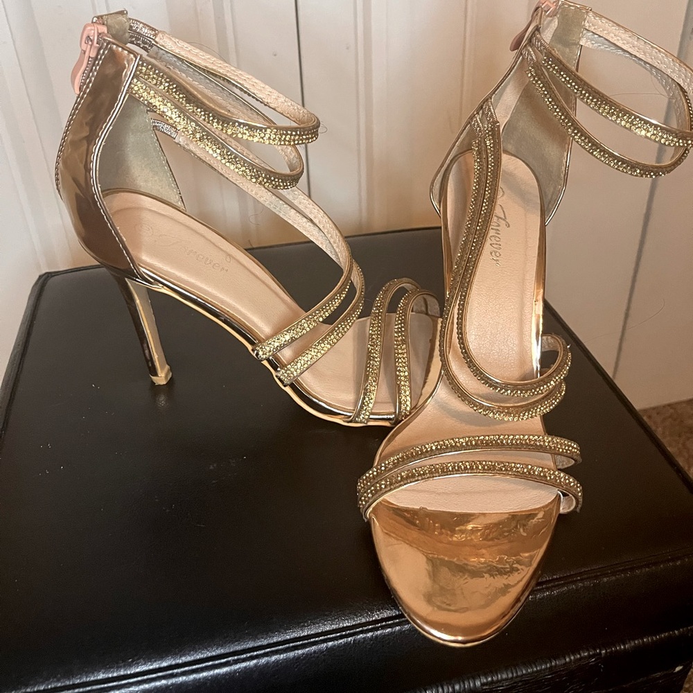 Gold strappy heels